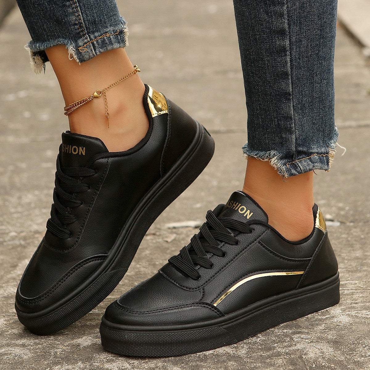 Women’s white round-toe flats with thick sole, casual lace-up style.