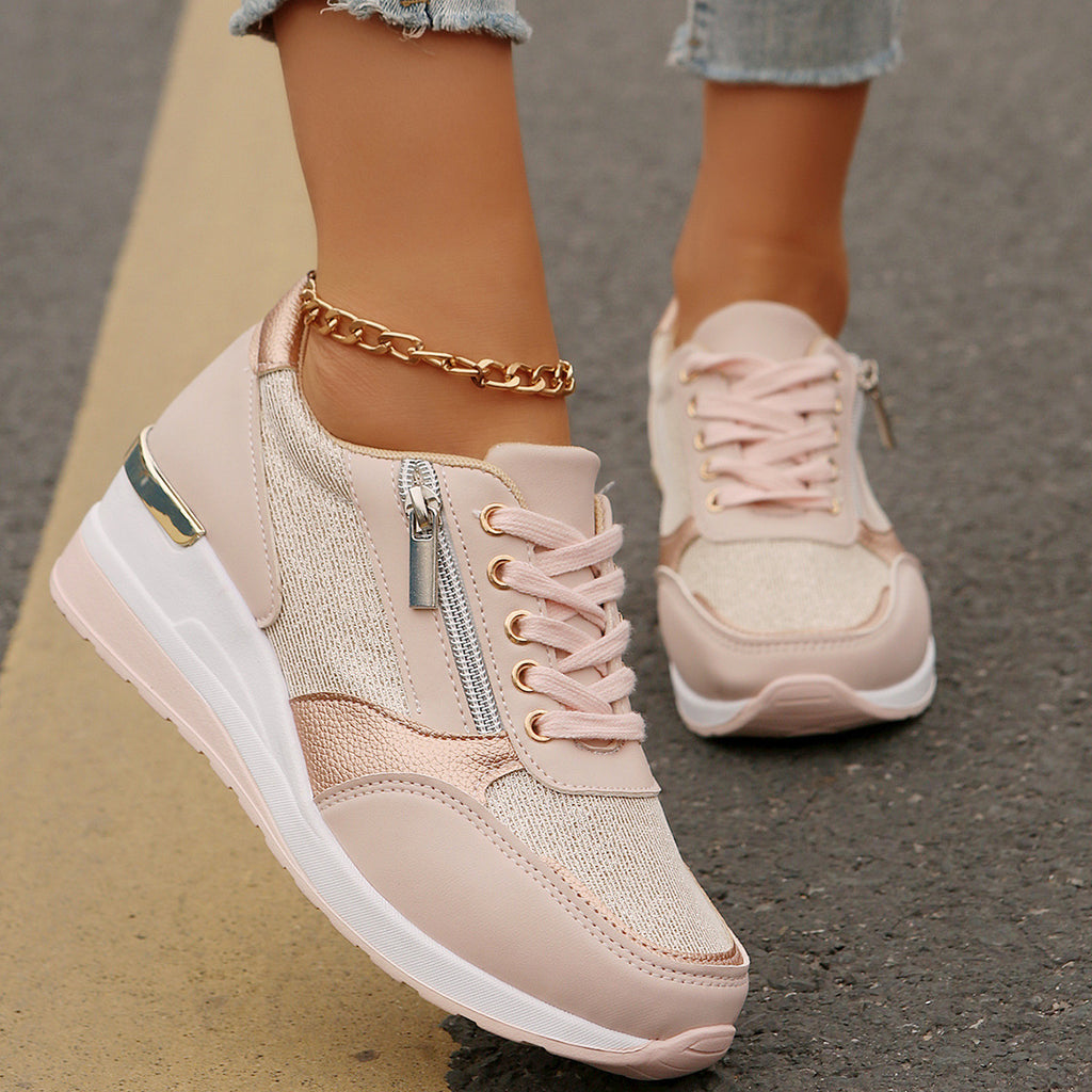 Women’s lace-up sneakers with side zipper and thick sole, casual sports style.
