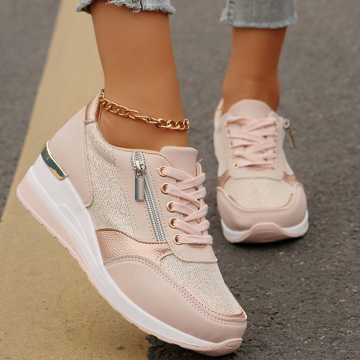 Women’s lace-up sneakers with side zipper and thick sole, casual sports style.