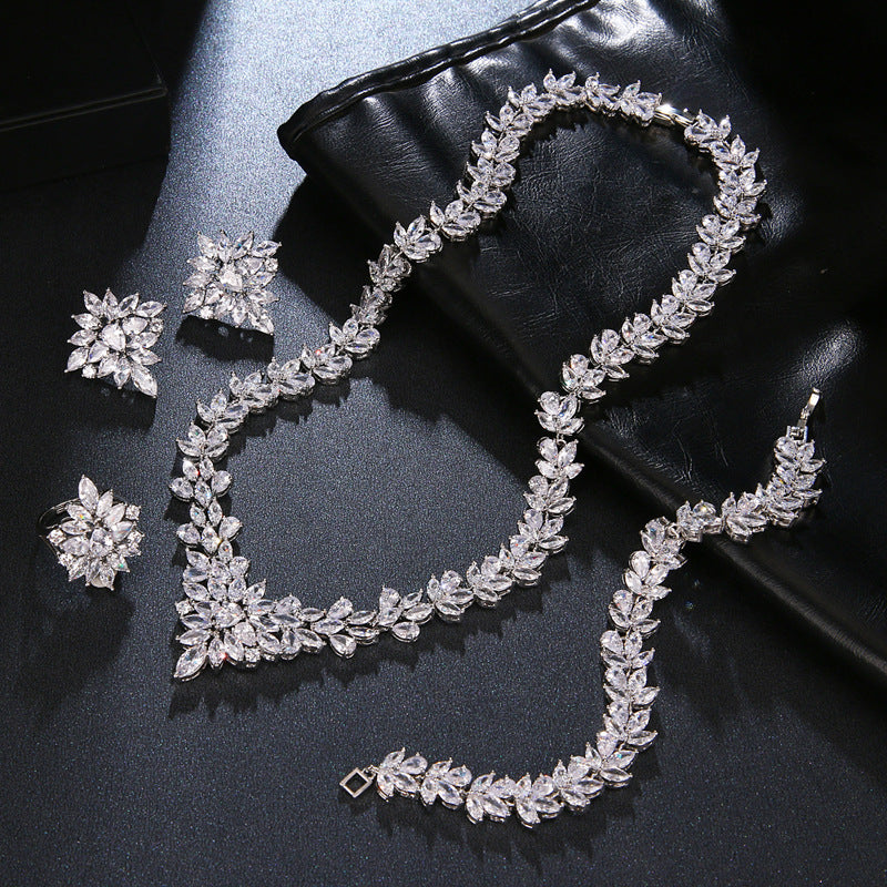 Is Handcrafted With Copper And Set With Zircon Stones.