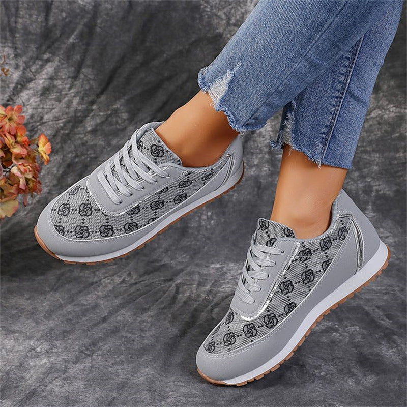 Women’s floral lace-up sneakers, lightweight breathable casual style.