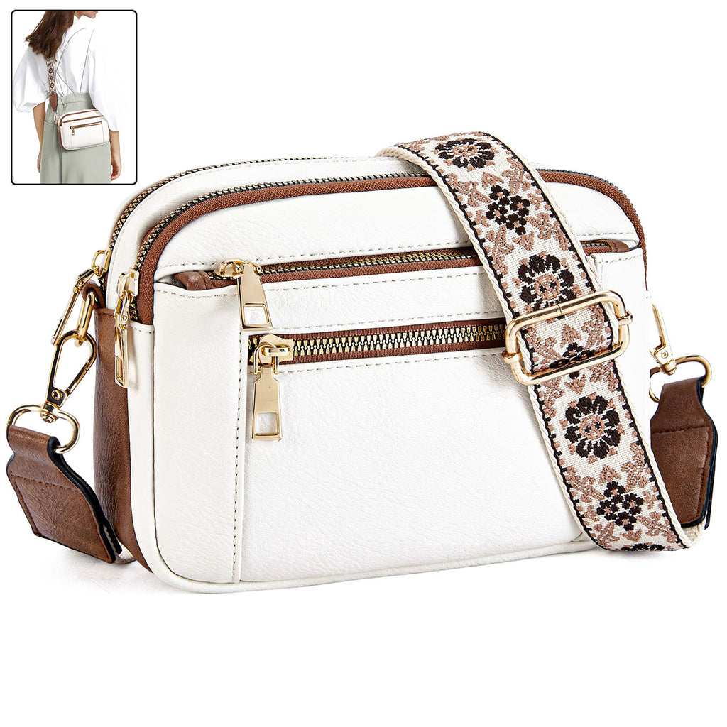 Women’s triple-zip colorblock crossbody bag with embroidered strap.