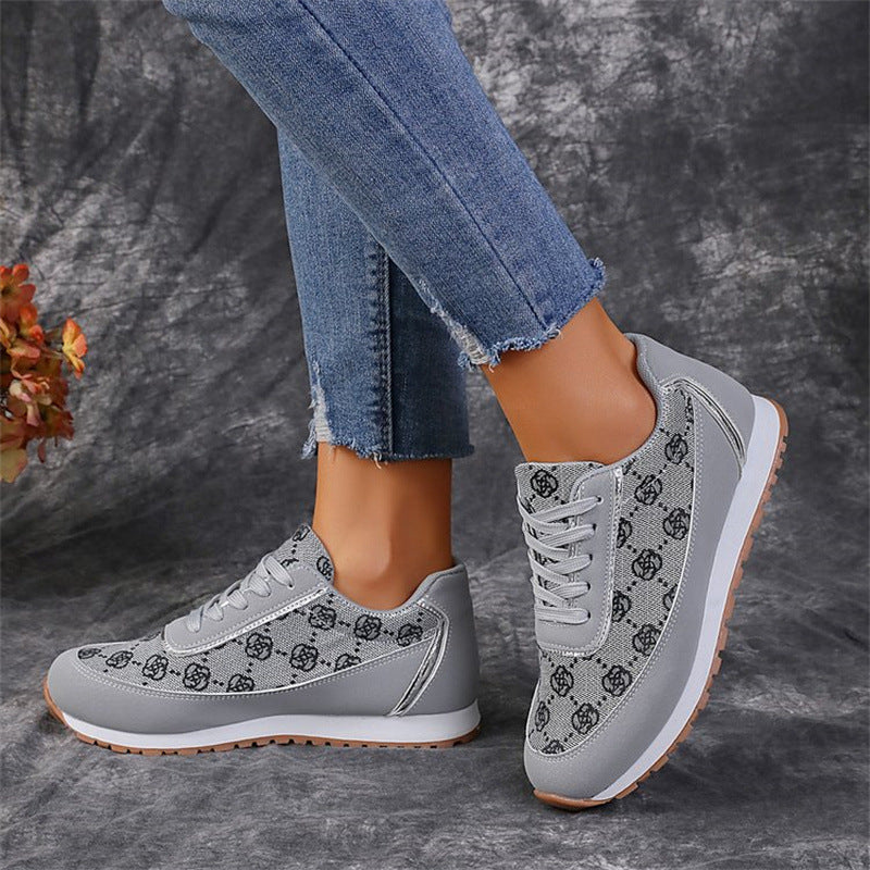 Women’s floral lace-up sneakers, lightweight breathable casual style.