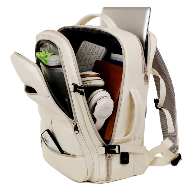 Large-capacity unisex backpack with multiple pockets for business travel.