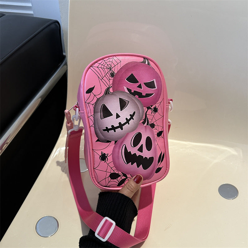 Mini Halloween cartoon crossbody bag with pumpkin, ghost, and bat print.