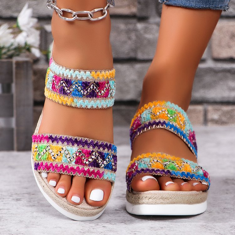 Women’s woven wavy-pattern wedge sandals with wide strap, ethnic summer style.