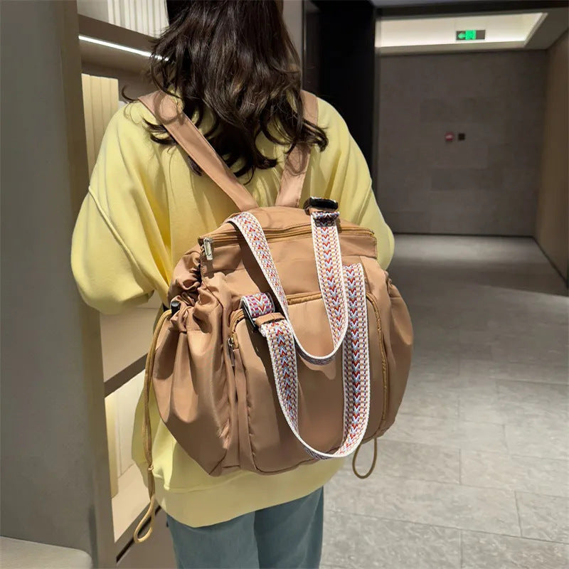 Women’s large waterproof multifunctional backpack, stylish travel bag.