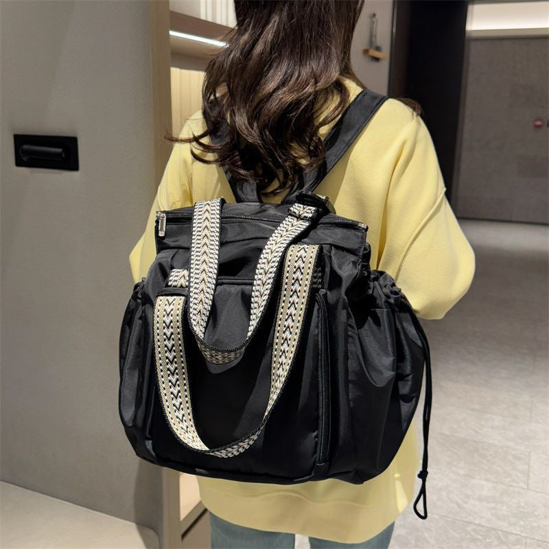 Women’s large waterproof multifunctional backpack, stylish travel bag.