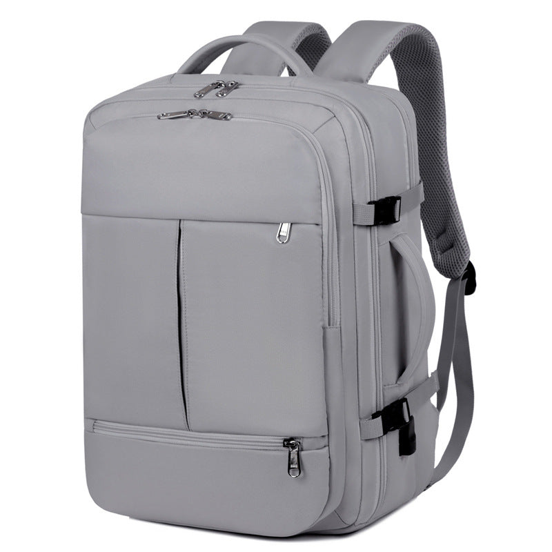 Large-capacity unisex backpack with multiple pockets for business travel.