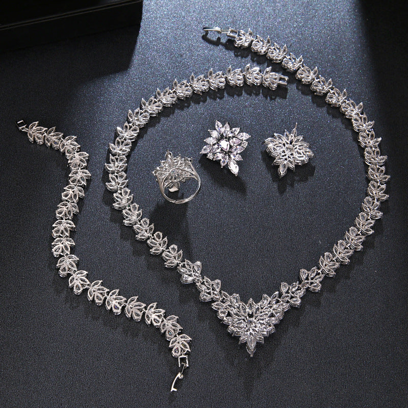 Is Handcrafted With Copper And Set With Zircon Stones.