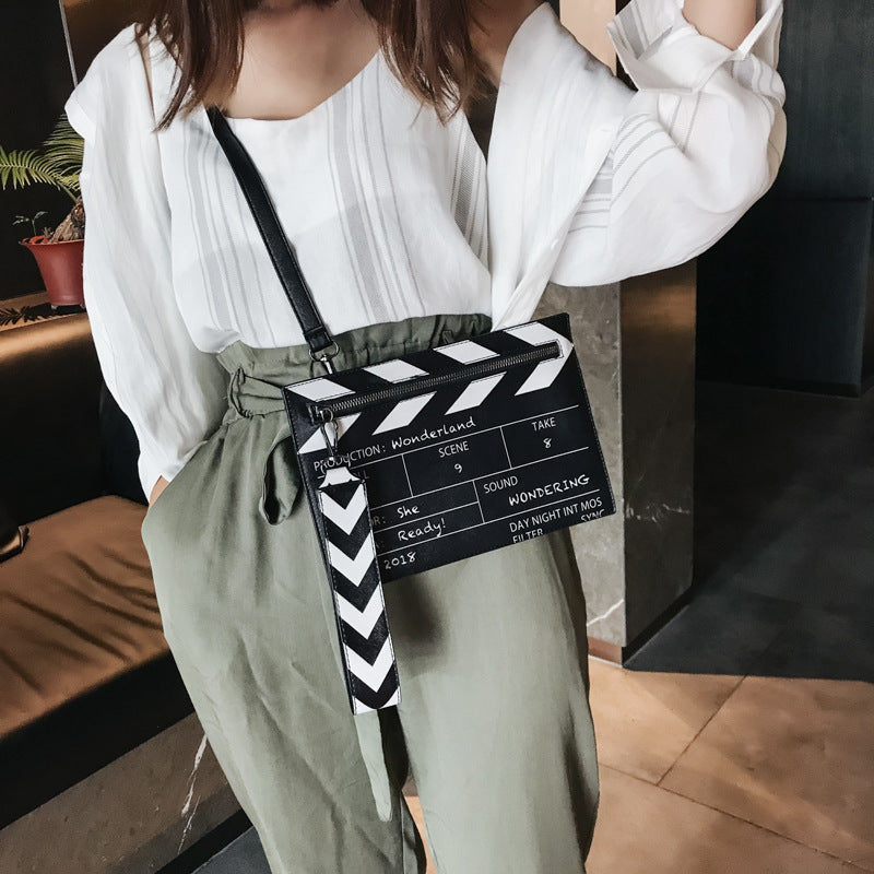 Women’s PU leather envelope clutch, casual crossbody bag.
