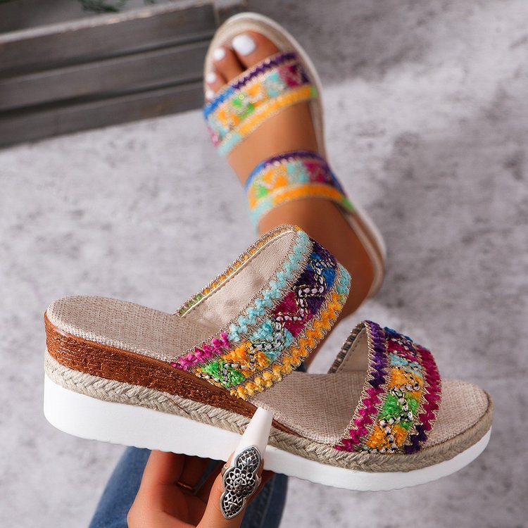Women’s woven wavy-pattern wedge sandals with wide strap, ethnic summer style.