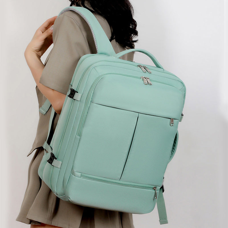 Large-capacity unisex backpack with multiple pockets for business travel.