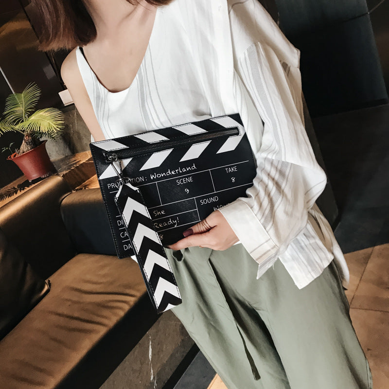 Women’s PU leather envelope clutch, casual crossbody bag.