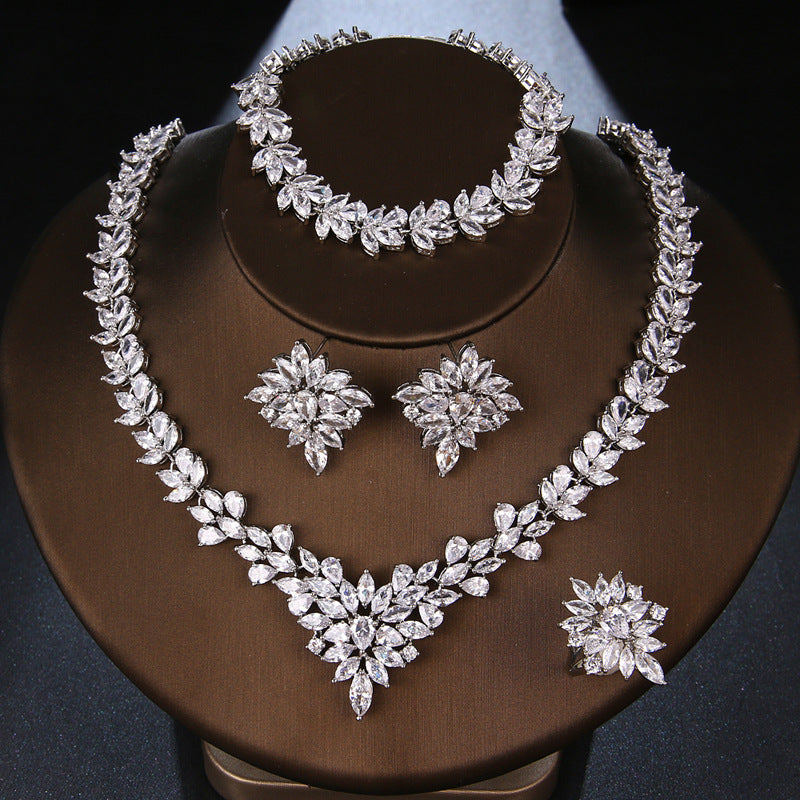 Is Handcrafted With Copper And Set With Zircon Stones.