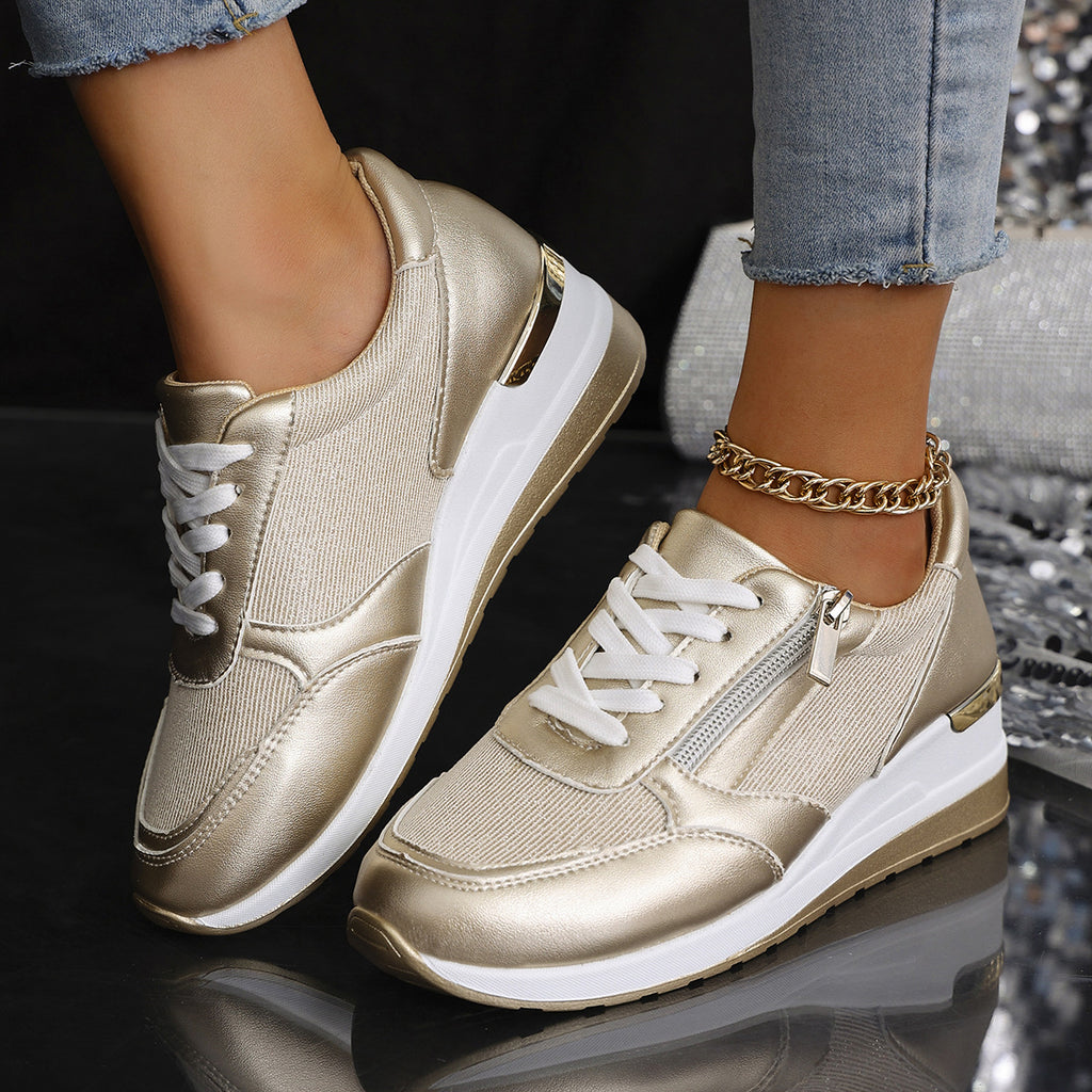 Women’s lace-up sneakers with side zipper and thick sole, casual sports style.