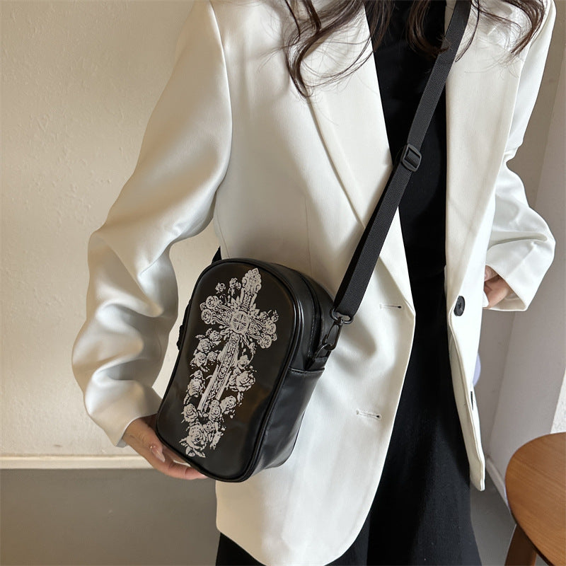 Mini Halloween cartoon crossbody bag with pumpkin, ghost, and bat print.