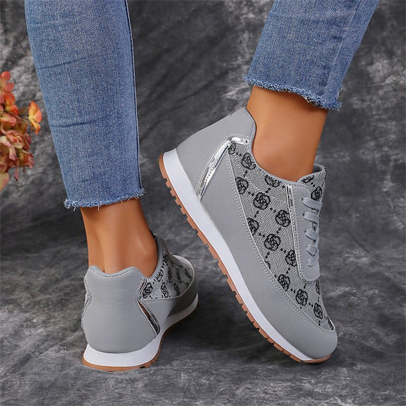 Women’s floral lace-up sneakers, lightweight breathable casual style.