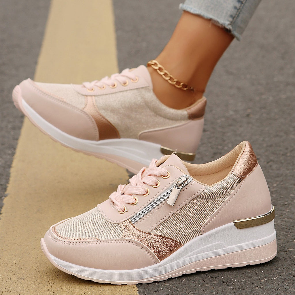 Women’s lace-up sneakers with side zipper and thick sole, casual sports style.