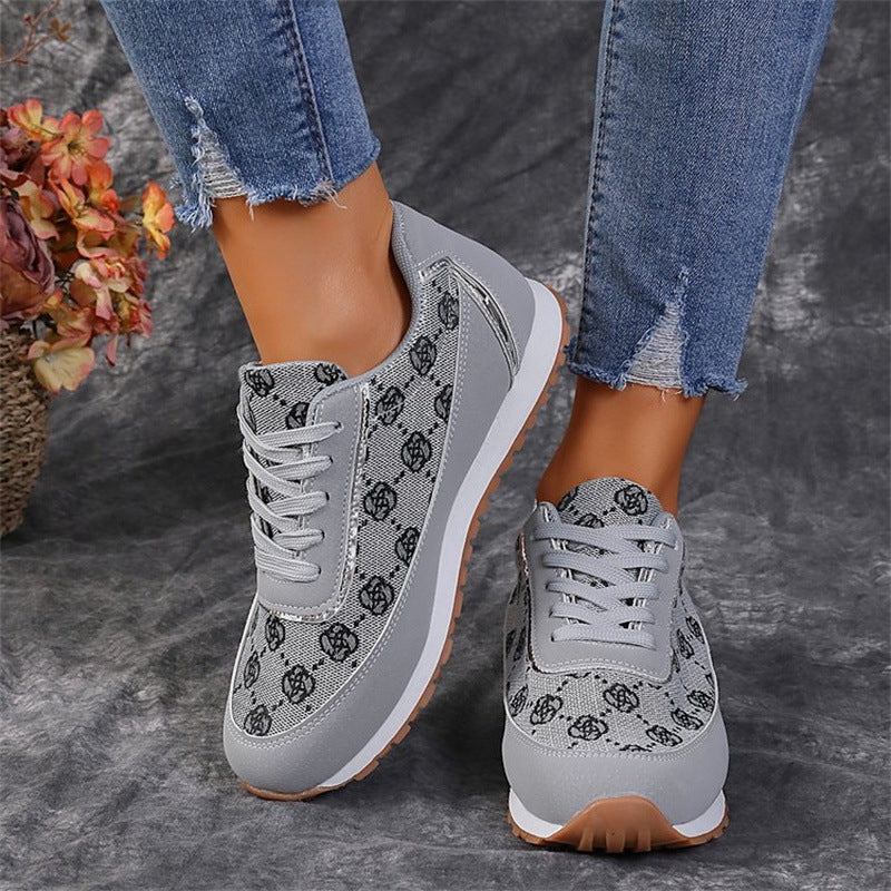 Women’s floral lace-up sneakers, lightweight breathable casual style.