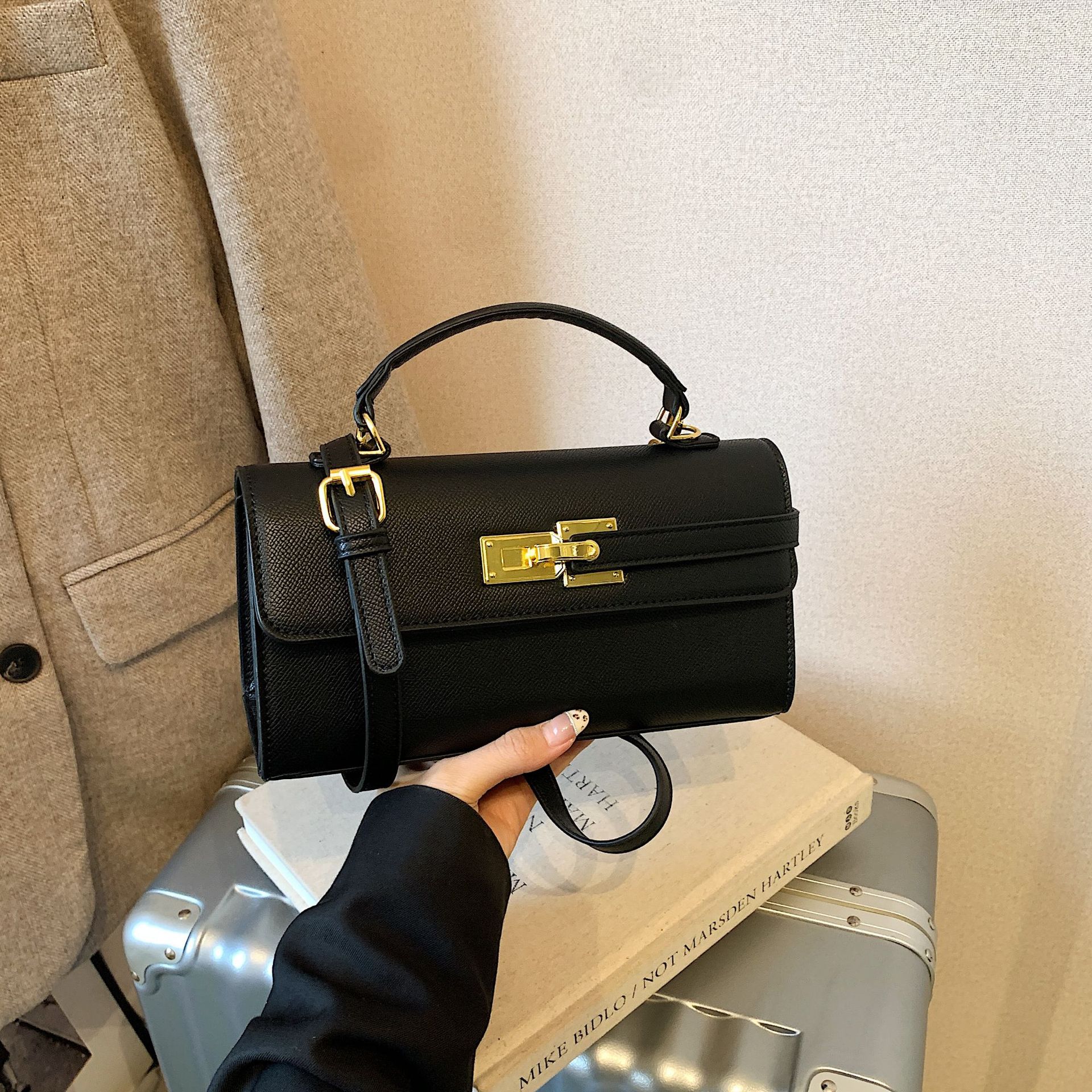 New Stylish Small Square Handbag With A Chic Lock Closure
